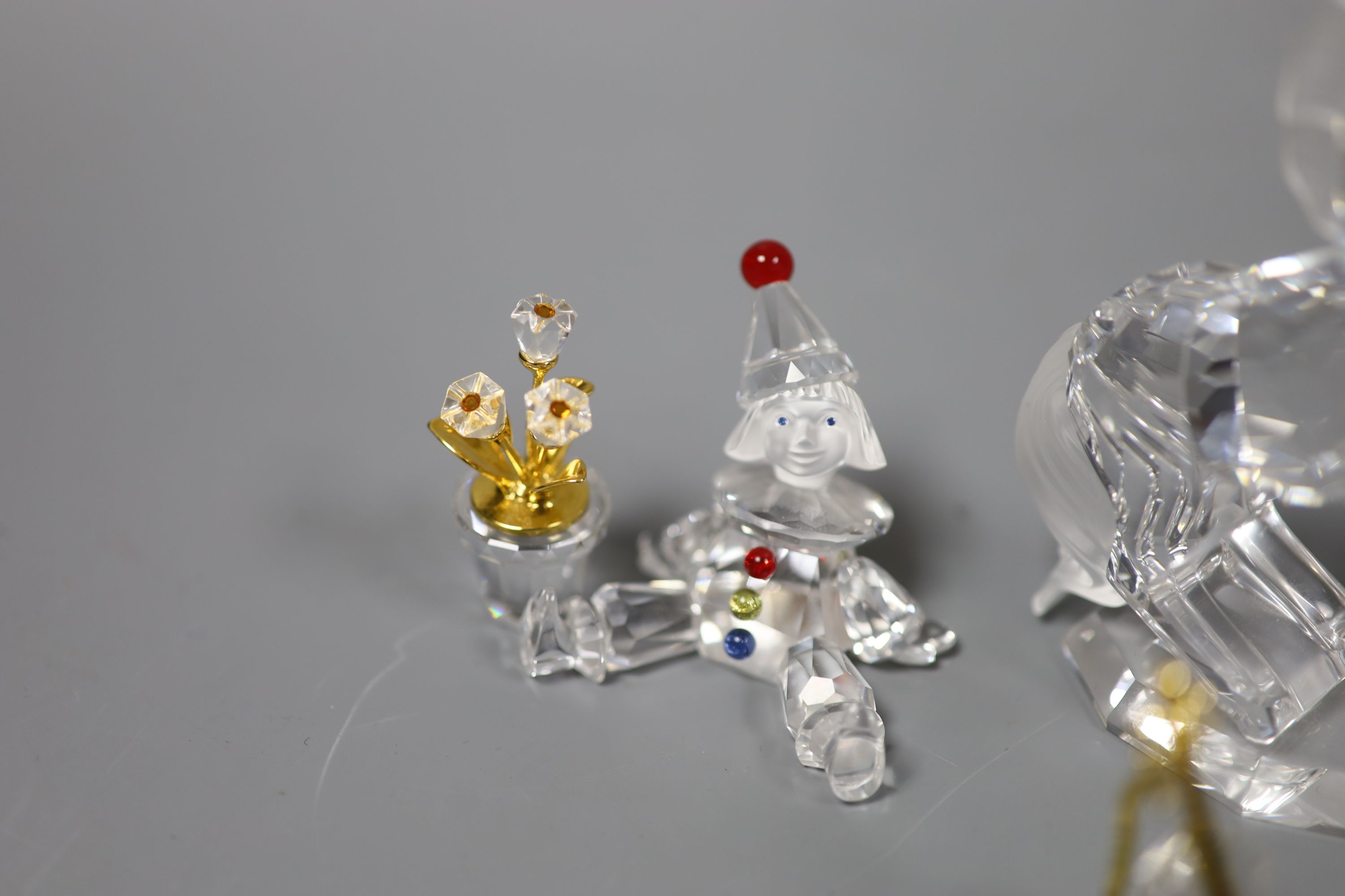 Thirteen Swarovski crystals including Pair of Horses and Seated Clown